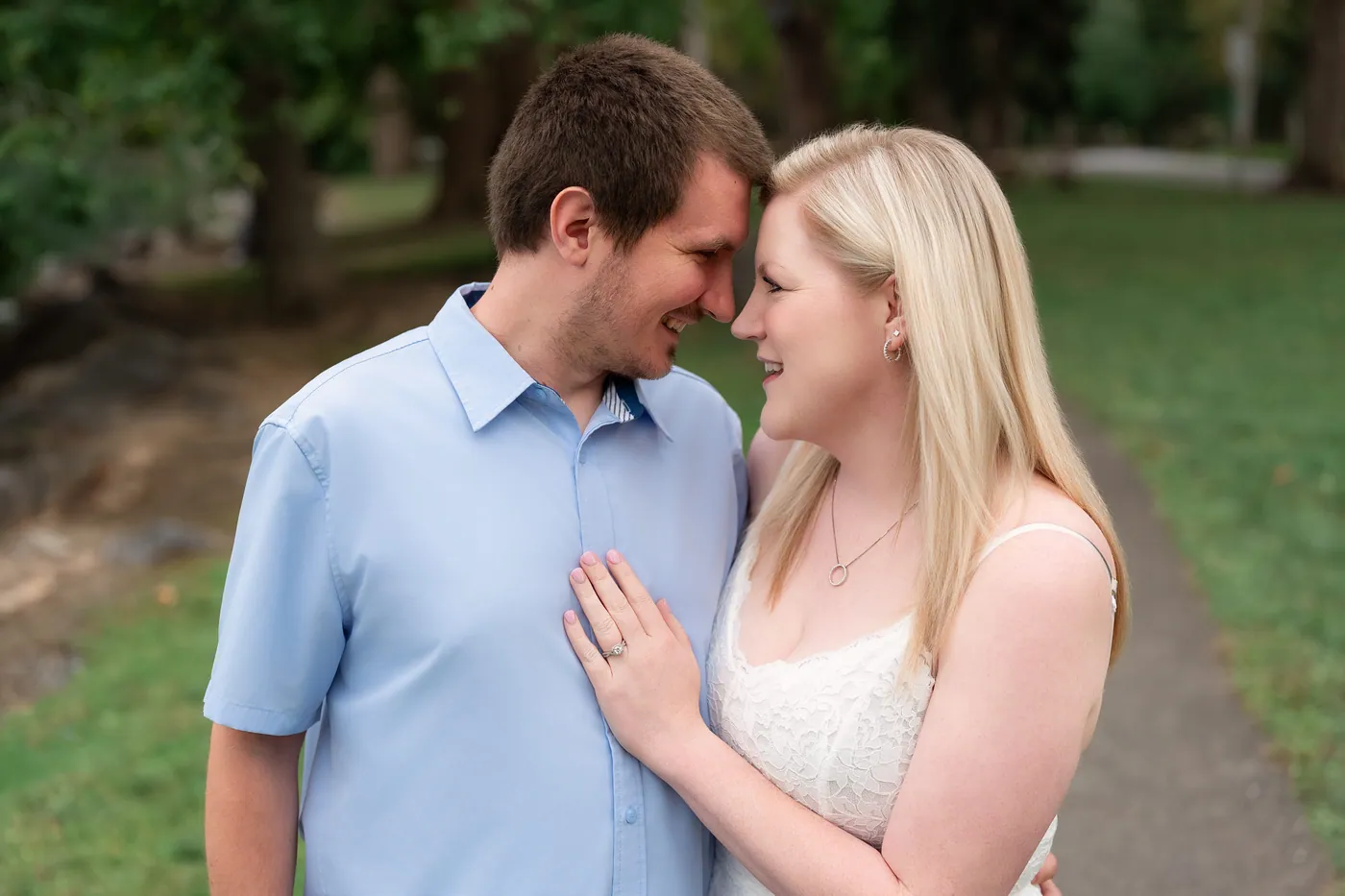 Kaitlyn and Nicholas sharing a quiet moment by the water
