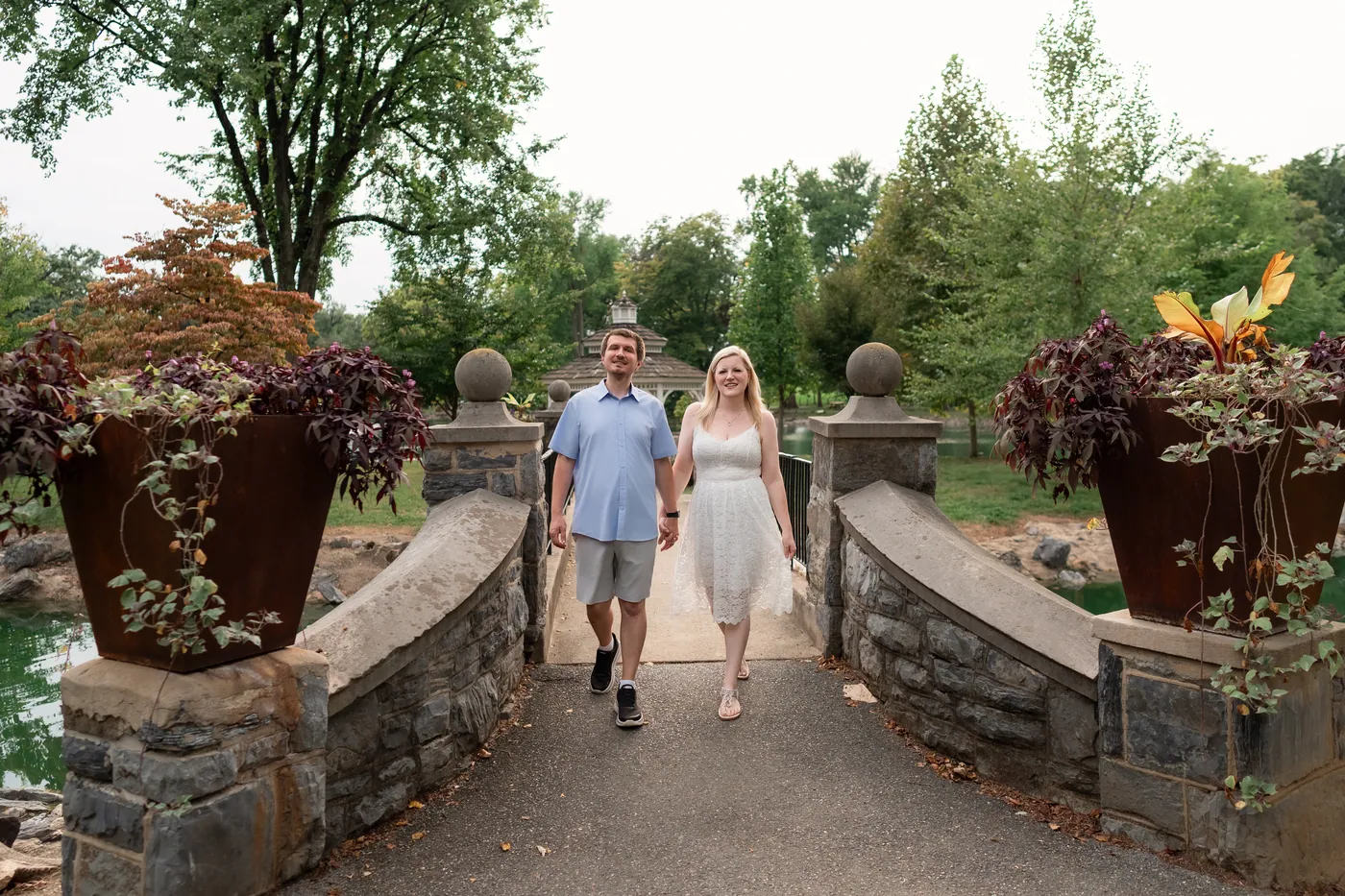 Kaitlyn and Nicholas walking through the garden