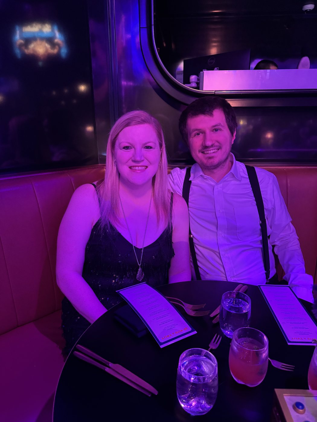 Kaitlyn and Nicholas at a dinner show on Virgin Voyages