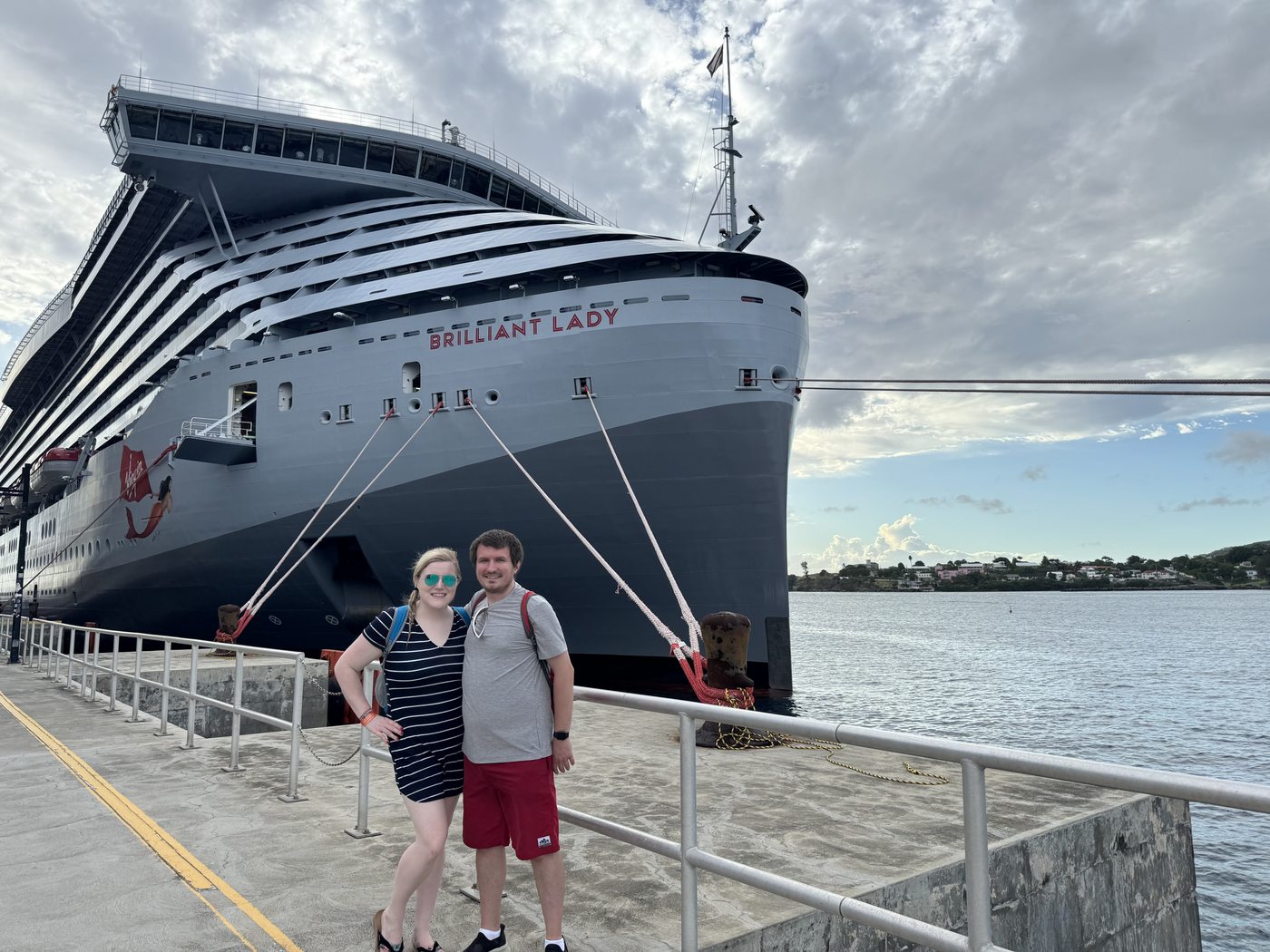 Kaitlyn and Nicholas with their Virgin Voyages ship in Costa Maya